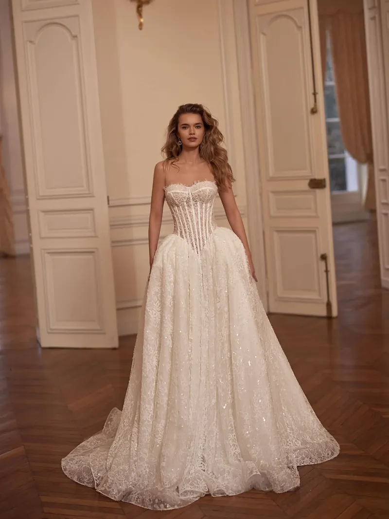 Robe de mariée Séléstia Avelia, bustier corset scintillant et jupe volumineuse